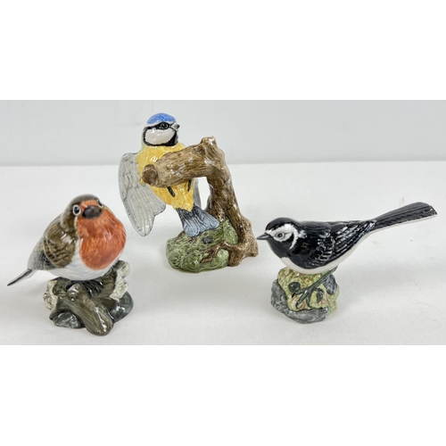 1230 - 3 R & J Mack ceramic bird figurines - Blue Tit, Robin and Pied Wagtail. Boxed, all with stamped crow... 