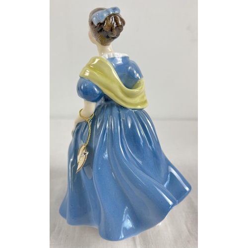 1233 - A ceramic figurine of 