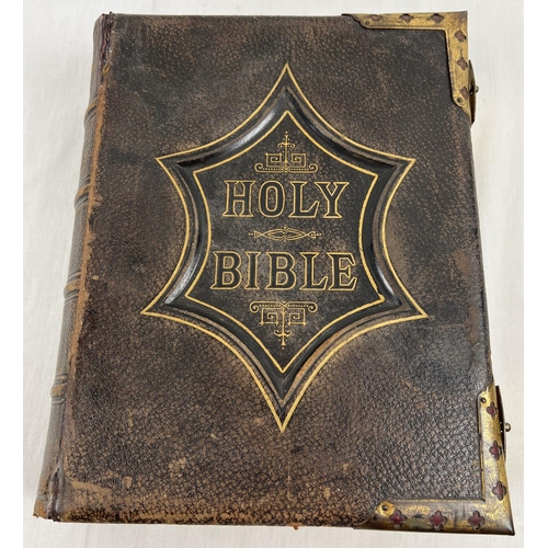 1263 - A large Victorian Leather & brass bound family bible with full sized coloured plates by Cassell & Co... 