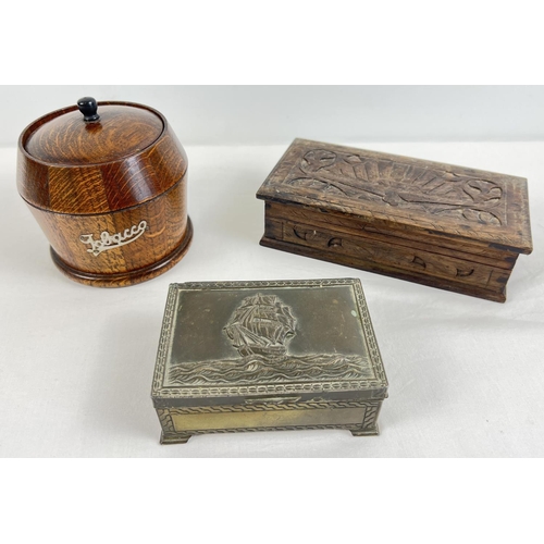 1305 - 3 mid century wooden & metal lidded boxes. A carved wooden trinket box with bird design and black ve... 