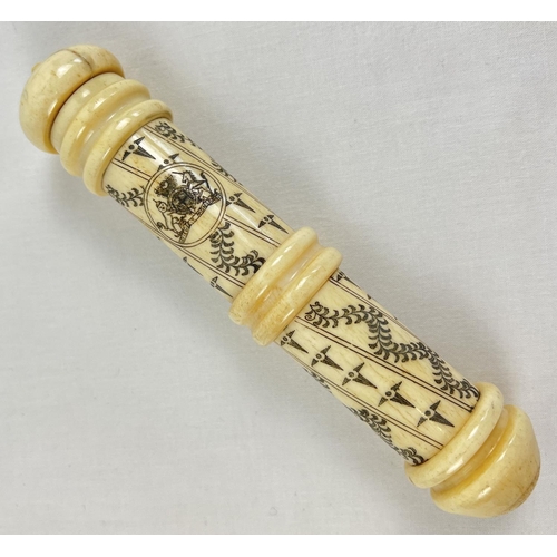 1307 - A carved bone Scrimshaw style screw top needle case with carved Royal Crest. Approx. 16.5cm long.