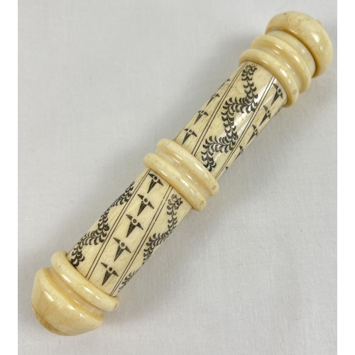 1307 - A carved bone Scrimshaw style screw top needle case with carved Royal Crest. Approx. 16.5cm long.