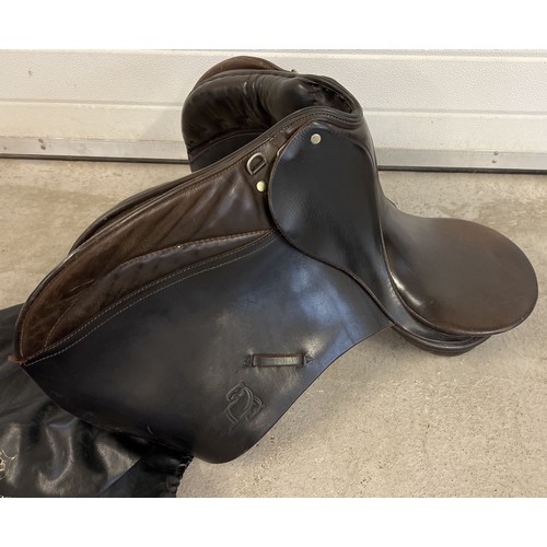 1311 - A Coleman Craft Saddlery 18 inch Ply-Bond Patented Springtree leather saddle complete with protectiv... 