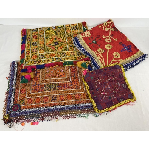 1319 - 4 Kuchi & Afghan Central Asian textile panels. To include embroidered pieces with bullion thread det... 