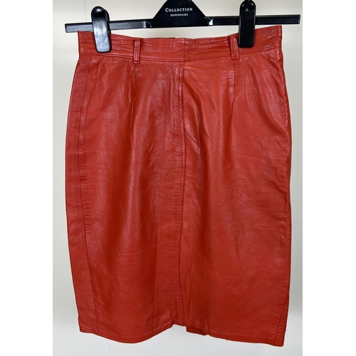 1328 - A vintage 1980's red leather pencil skirt with zip and press stud fastening. Size 12.