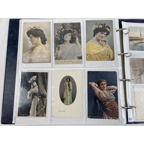 1267 - An album containing approx. 280 assorted vintage postcards. To include: British and overseas street ... 