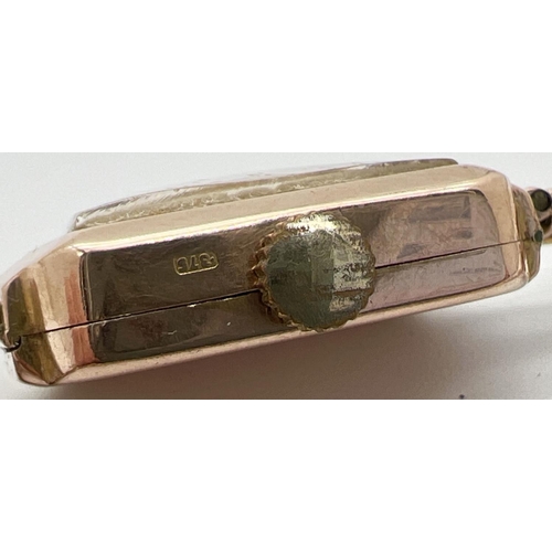 1150 - A ladies 9ct gold vintage 15 jewels Swiss made wristwatch. Rectangular shaped case with expanding br... 