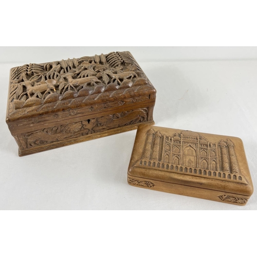 1281 - 2 carved wooden jewellery/trinket boxes. A box with lift out tray to interior, highly carved lid wit... 