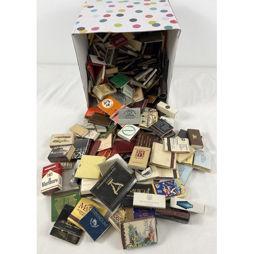 1285 - A collection of vintage matchboxes and match books from around the world. To include advertising fro... 