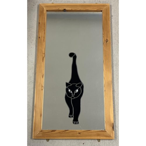 1349 - A large, modern pine framed mirror with leaded glass black cat applied design. Complete with hanging... 