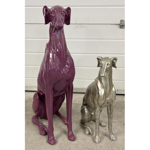 1289 - 2 large resign greyhound figures, in purple and silver. Tallest approx. 76cm tall.