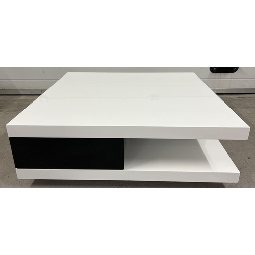 1355 - A modern black and white square shaped low coffee table with gloss finish. with 2 black drawers and ... 