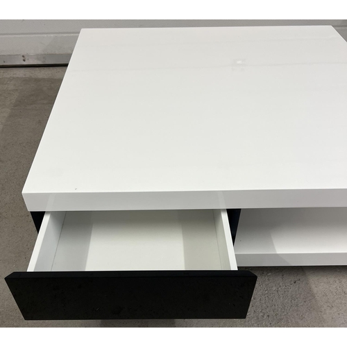 1355 - A modern black and white square shaped low coffee table with gloss finish. with 2 black drawers and ... 