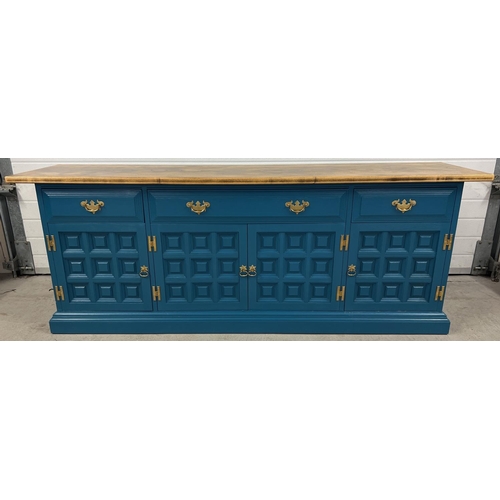 1356 - A modern solid wood sideboard with natural wood top and teal painted base. 4 cupboards to base with ... 