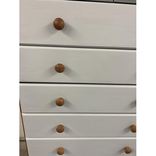 1370 - A modern 10 drawer chest of drawers with painted grey drawer fronts. Natural wood finish and knob ha... 