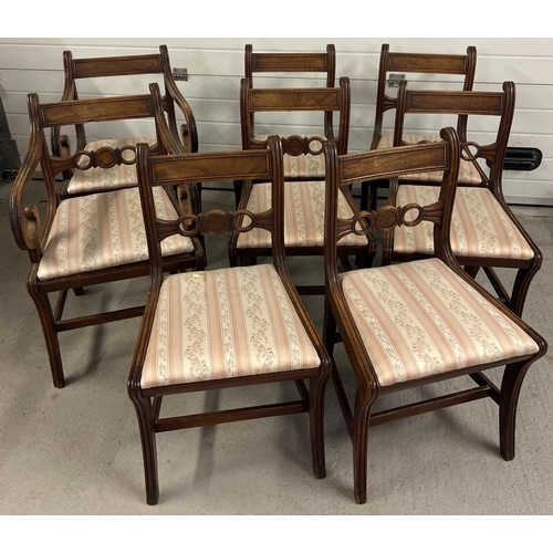 1377 - A set of 8 Regency curved leg dining chairs with panelled backs, 2 carvers and 6 chairs. Decorative ... 