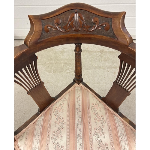 1382 - A Victorian dark wood corner chair with carved detail to back and fanned spindle design. Turned legs... 