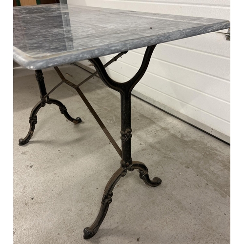 1386 - A vintage cast metal based rectangular garden table with marble top. Top has crack (approx. 28cm lon... 