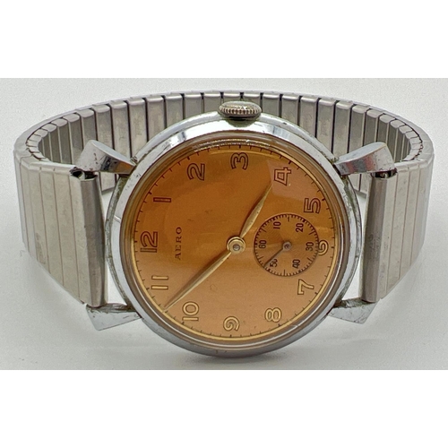 1160 - A vintage men's wristwatch by Aero, with secondary dial. Gold tone face with pale gold hour markers ... 