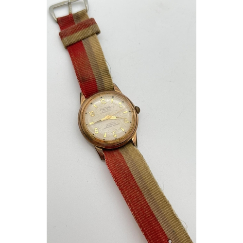 1161 - A men's vintage automatic wristwatch by Allaine. Goldtone case, hours markers and hands. With vintag... 