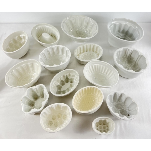 1218 - A collection of 15 assorted vintage & antique ceramic jelly & blancmange moulds. In vary sizes and s... 