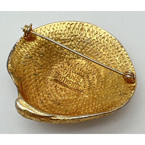 1069 - A vintage 'Vans Authentic' gold tone oyster shell brooch. Approx. 5cm x 5.5cm.