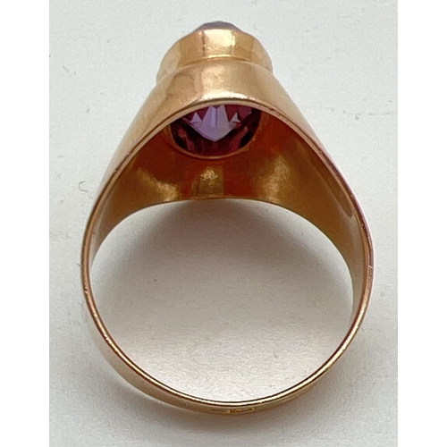 1070 - A vintage style 14ct gold dress ring with a bezel set oval cut colour changing Alexandrite stone - p... 