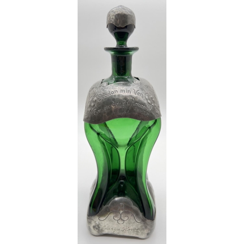 1236 - An Art Nouveau Holmegaard glass Kluk Kluk decanter with pewter overlay. Attributed to Jacob Bang, pe... 