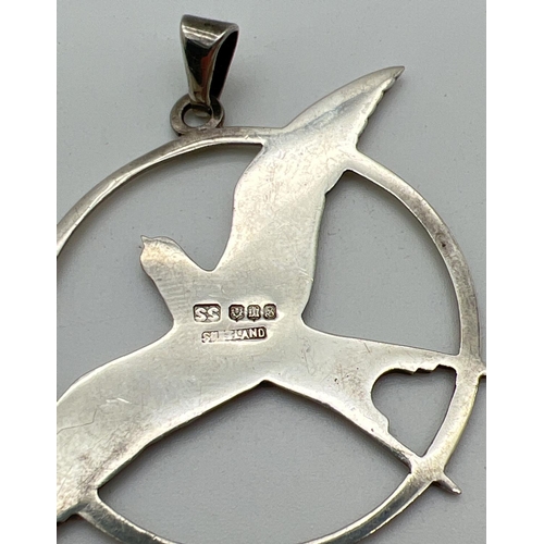 1010 - A large vintage Scottish silver swallow pendant. Hallmarked Edinburgh 1973 to reverse with makers ma... 