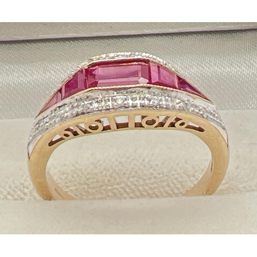 1003 - A 9ct gold Art Deco design diamond and ruby set dress ring by Luke Stockley, London. Central baguett... 