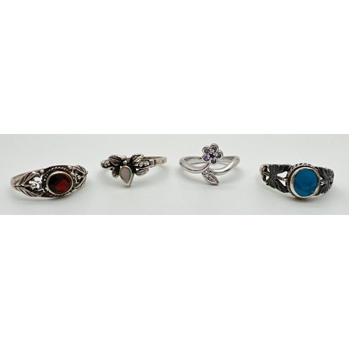 1090 - 4 silver dress rings, 2 with butterfly detail. All natural stone set to include turquoise, garnet an... 