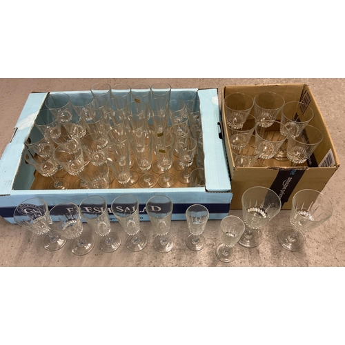 1237 - 2 boxes containing a large quantity of matching French crystal stemmed glasses, by Luminarc. Some wi... 