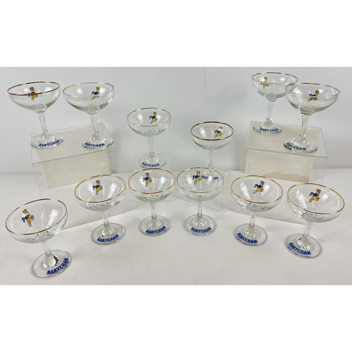 1240 - A set of 12 matching mid century Babycham stemmed glasses.