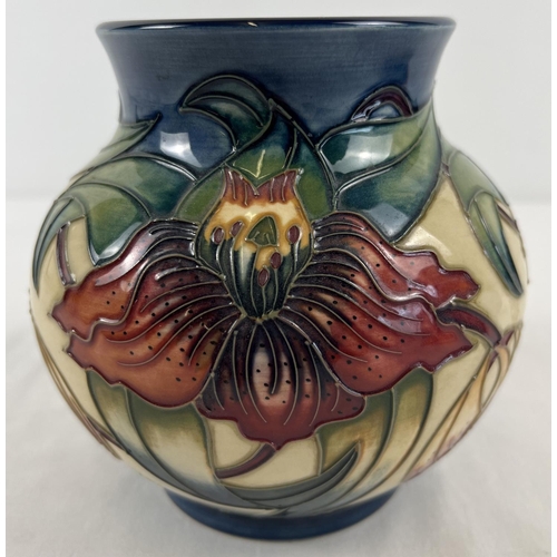 1220 - A Moorcroft Anna Lily design vase of bulbous form, stamped and signed to underside. Design by Nicola... 