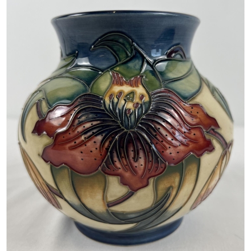 1220 - A Moorcroft Anna Lily design vase of bulbous form, stamped and signed to underside. Design by Nicola... 