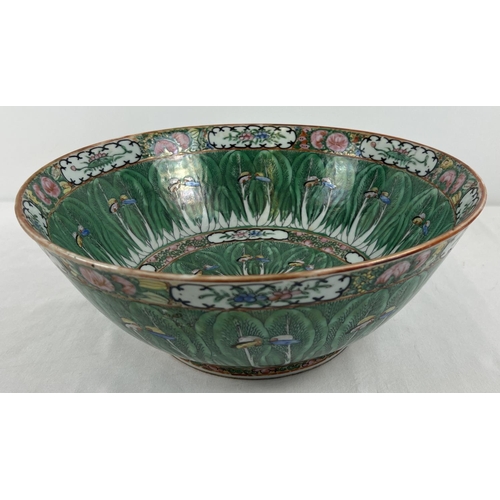 1249 - A 20th century oriental large bowl in famille verte, with butterfly detail. Stamp to base. Approx. 3... 