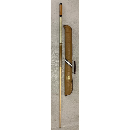 1279 - A 3 sectional wooden snooker cue by Riley complete with carry case.