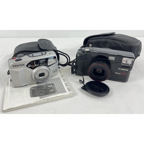 1273 - A Pentax Espio 738G camera (with zoom lens) with carry case & instruction book. Together with a Cano... 