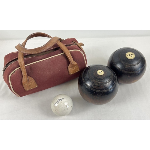 1300 - A cased pair of Jaques & son 1506 Pr 4 lawn bowls together with a Taylor-Rolph Co. Ltd 