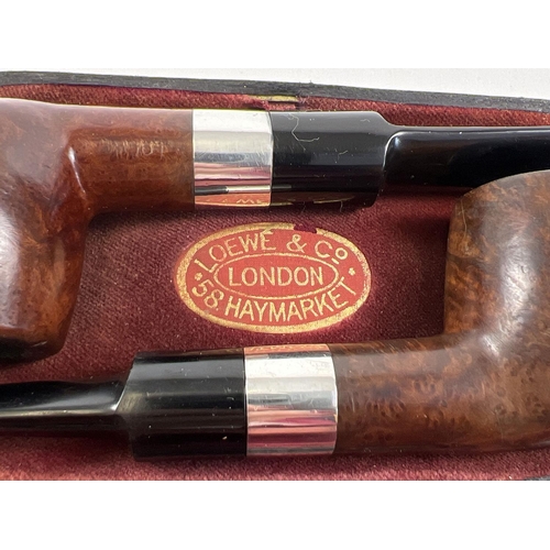 1189 - 2 cased Loewe & Co silver banded pipes, fully hallmarked for London 1919. Makers marks to silver col... 