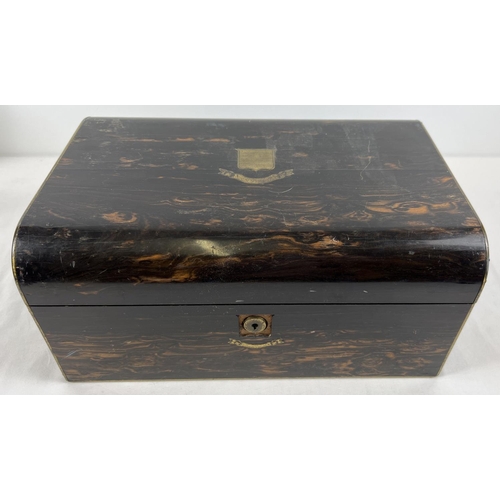 1301 - An antique coromandel wood writing box with brass inlay, in need of restoration. Interior writing sl... 