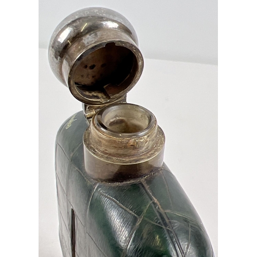 1191 - An antique silver plated and green leather covered hip flask. Hinged lid has twist lock feature. App... 