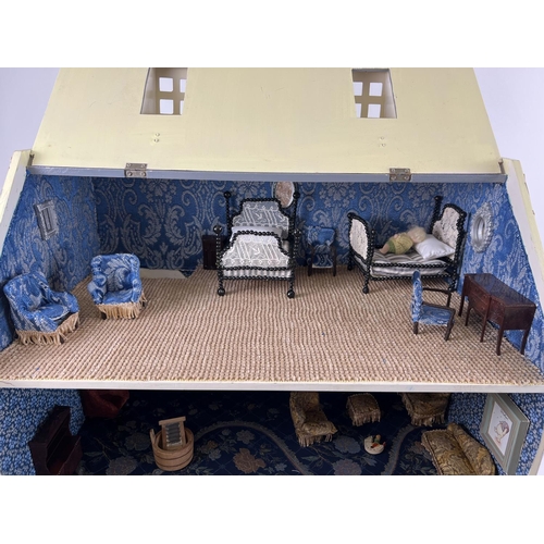 1315 - A large 3 storey fully furnished dolls house with a quantity of Westacre style dolls furniture. To i... 