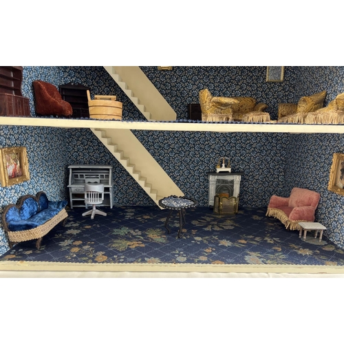 1315 - A large 3 storey fully furnished dolls house with a quantity of Westacre style dolls furniture. To i... 