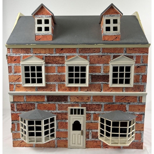 1315 - A large 3 storey fully furnished dolls house with a quantity of Westacre style dolls furniture. To i... 