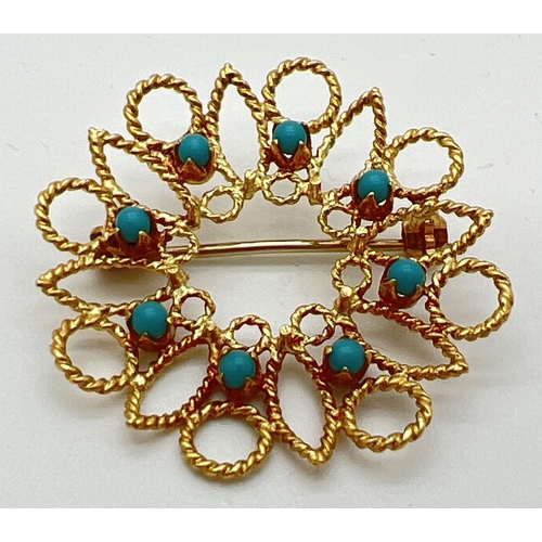 159 - A 18ct gold open work circular brooch set with 8 small round turquoise cabochons. Secure pin to back... 