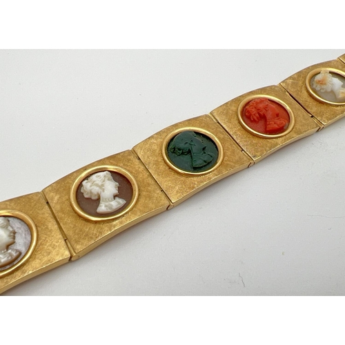 160 - A vintage 8 panel 18ct brushed gold bracelet set with varying colour semi-precious stone cameos. Pus...