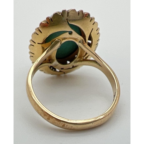 171 - A vintage Mexican 14k gold dress ring set with an oval cut cabochon of turquoise in a sunflower desi... 