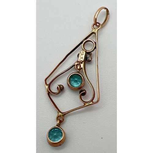 1007 - An Art Nouveau 9ct rose gold floral detail drop pendant set with 2 round cut bezel set blue topaz st... 