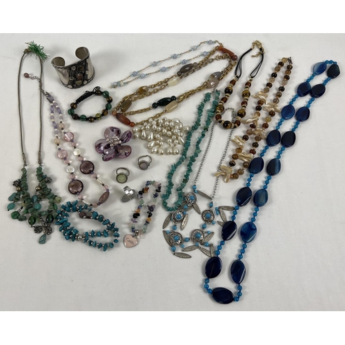 1021 - A collection of assorted vintage and modern costume jewellery to include natural stone items. Lot in... 